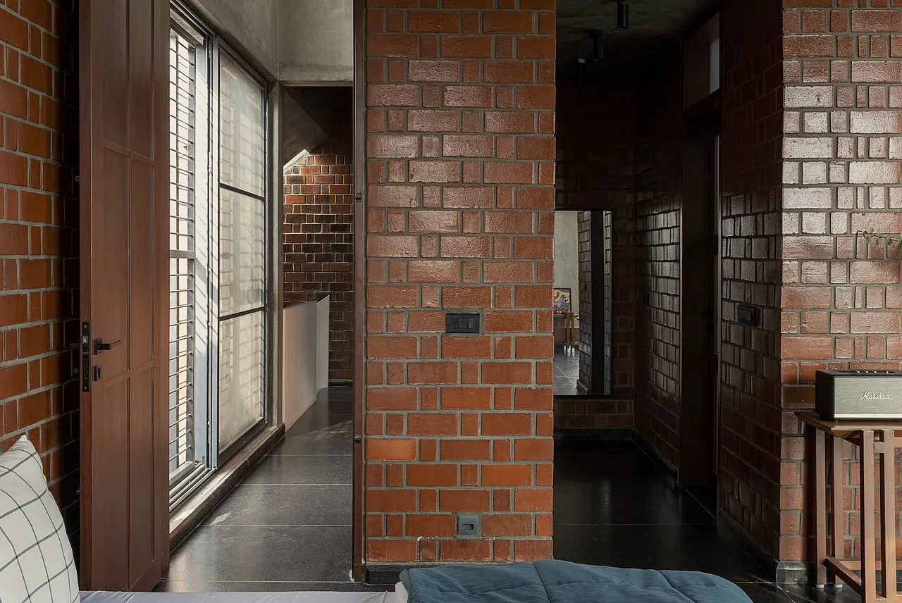 Modernist Brick and Concrete Studio Layout